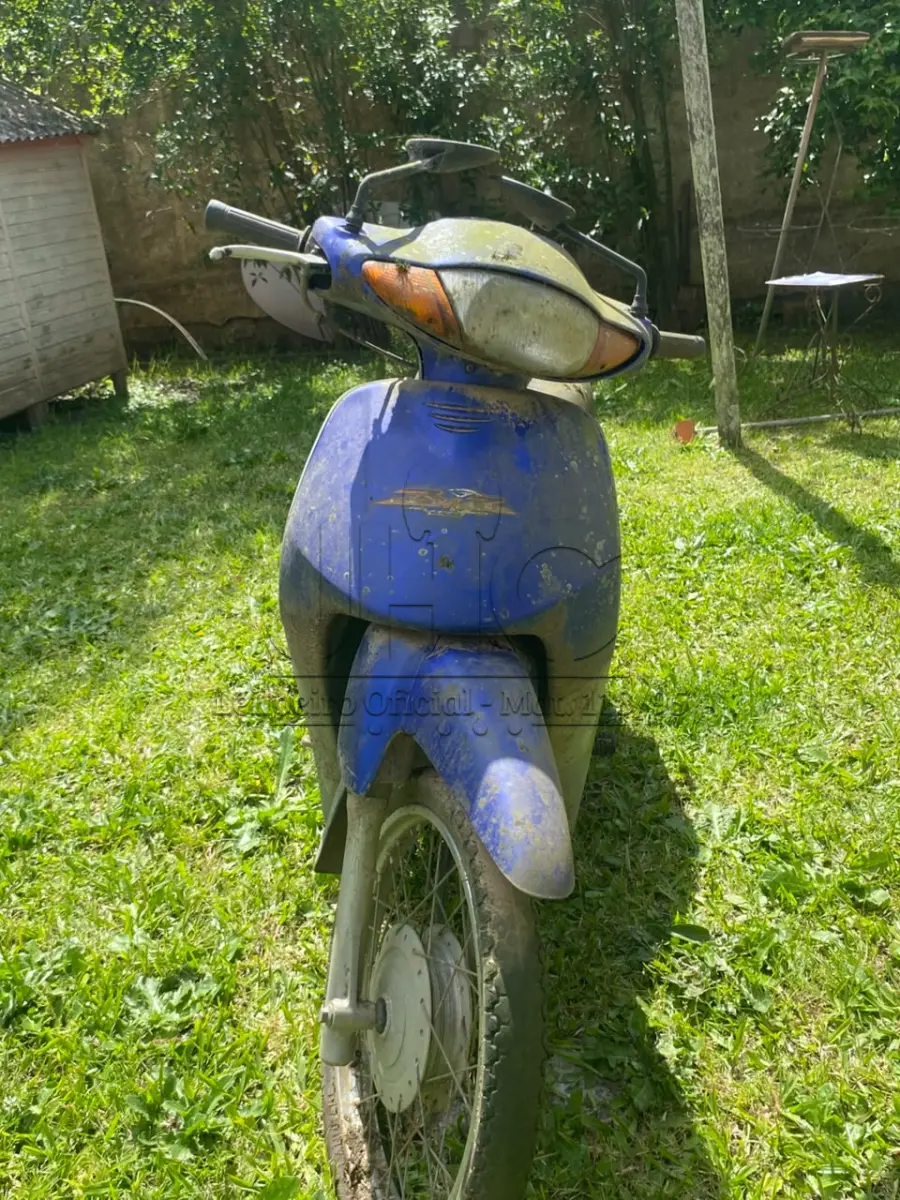 LOTE 000 - UMA MOTOCICLETA HONDA BIZ C100 - PLACA ILH-9538 - 2003/2003