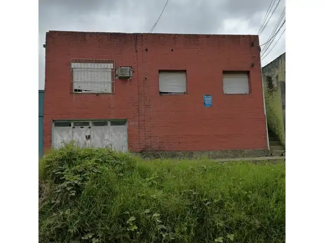 UM PRÉDIO DE ALVENARIA NA RUA RODRIGUES LIMA - CENTRO - BAGÉ/RS