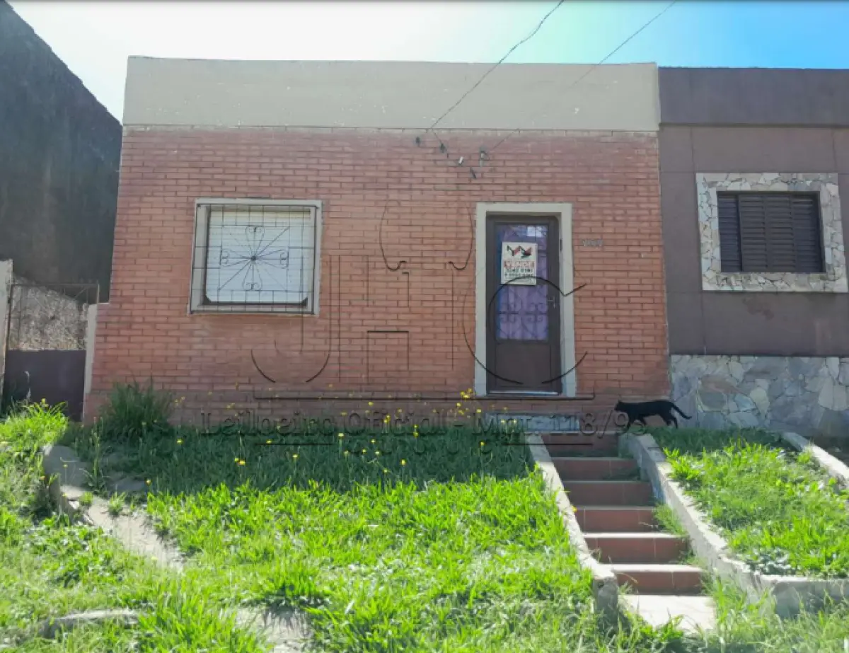 LOTE 001 - A QUOTA PARTE CORRESPONDENTE A 25% DE UMA CASA DE ALVENARIA NO BAIRRO GETÚLIO VARGAS - BAGÉ/RS