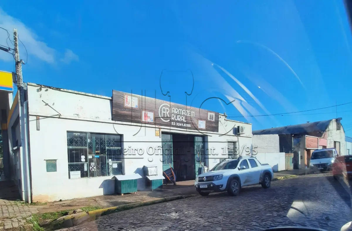 LOTE 000 - UM PRÉDIO COMERCIAL DE ALVENARIA NA RUA CORONEL PEDROSO - 28m x 29m