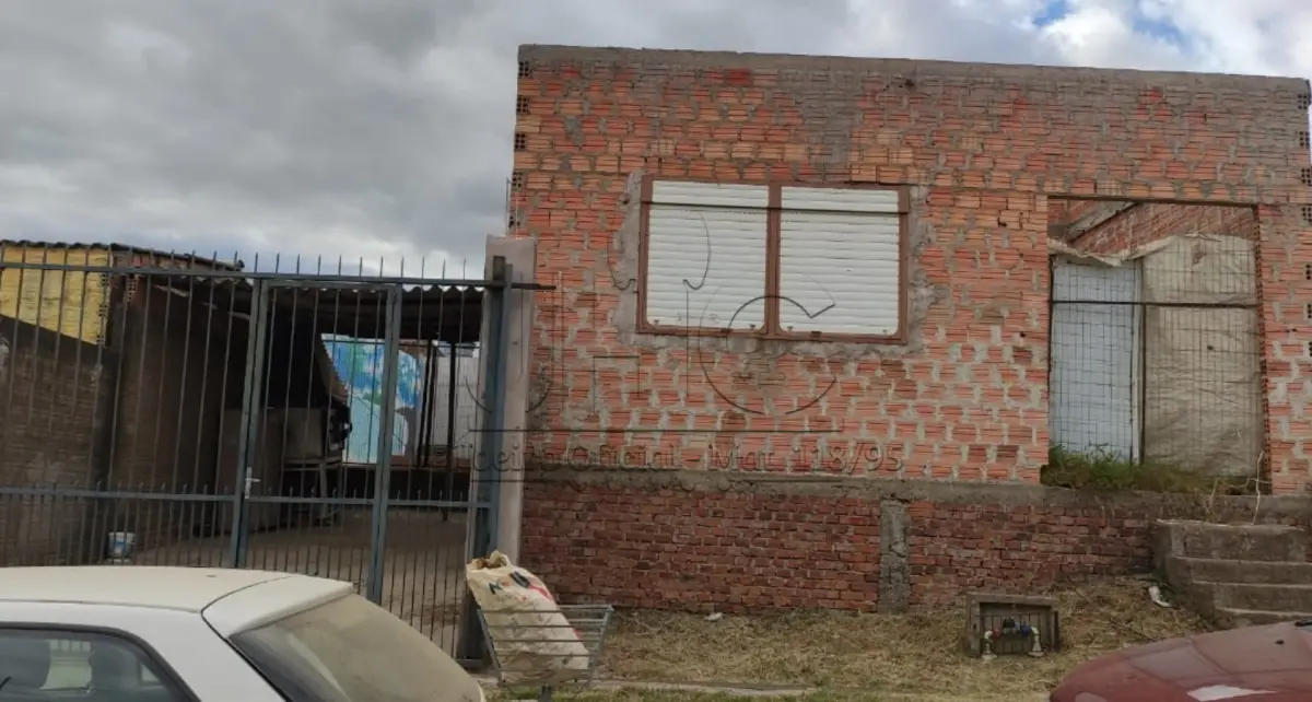 LOTE 000 - UMA CASA NA RUA MÁRIO LOUGUÉRCIO PAIVA, N° 1121 EM BAGÉ/RS