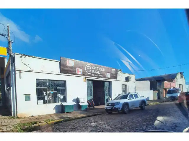 UM PRÉDIO COMERCIAL DE ALVENARIA NA RUA CORONEL PEDROSO - 28m x 29m