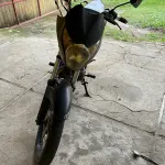 LOTE 002 - UMA MOTOCICLETA HONDA CG/150 TITAN, PLACA IQHH-5J38, ANO/MODELO 2009/2009, COR CINZA
